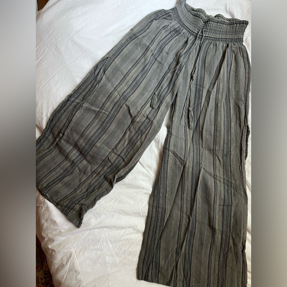 Grey capris with linen texture.